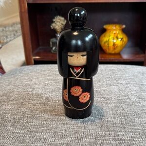 Black Wooden Kokeshi Doll with Floral Design
